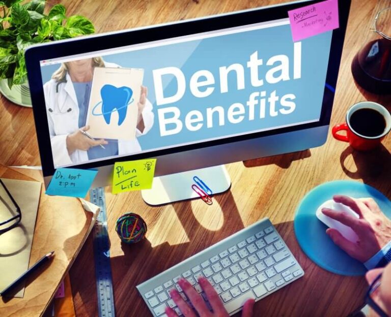 Patient reviewing dental insurance benefits on computer 1, What You Need to Know About In-Network vs. Out-of-Network Dental Coverage