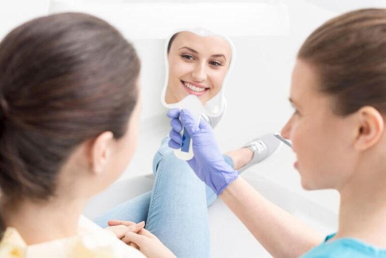 dental patient smiling after digital smile design procedure, What Is An Abutment For Dental Implants?