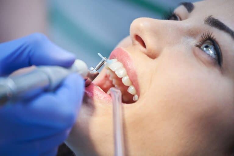 dental patient undergoing teeth cleaning, What Are The Benefits Of Teeth Cleanings In Hamilton, GA?