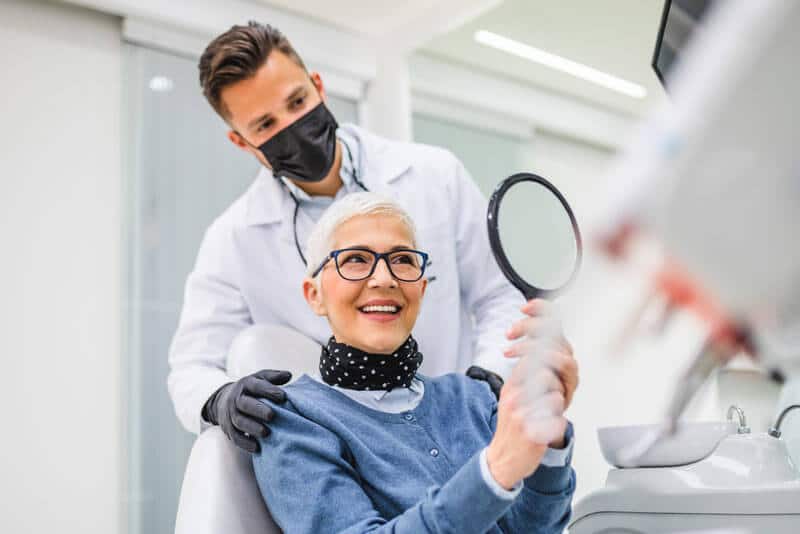 patient getting dental implants, Hamilton