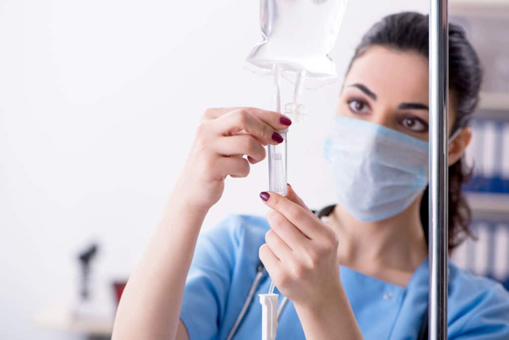 assistant with iv drip bag, IV Sedation