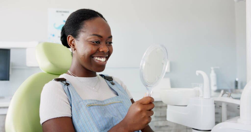 woman happy with smile, Same-Day Crowns