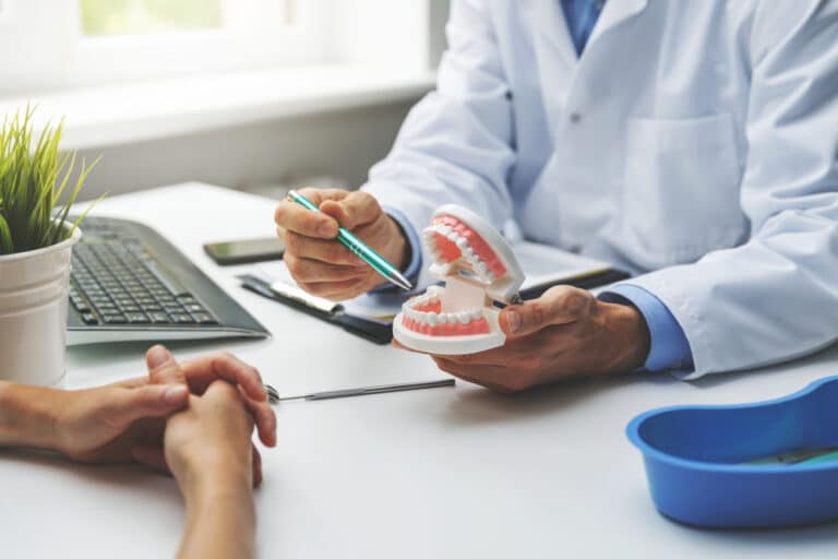 dentist speaking with a patient