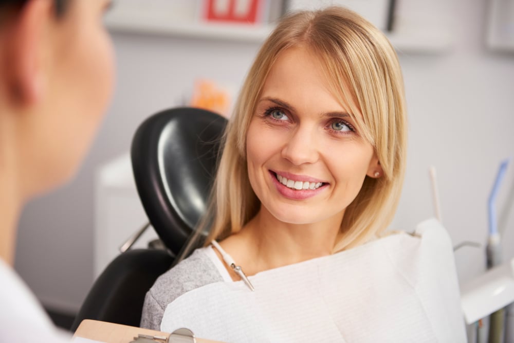 Woman smiling at dentist