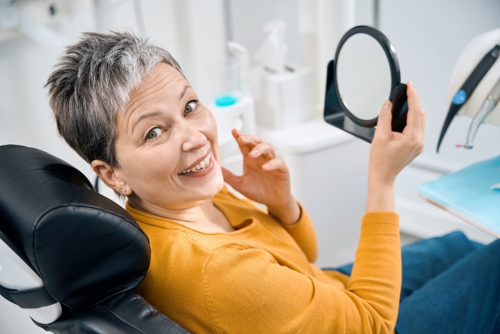 Woman smiling in dentist chair