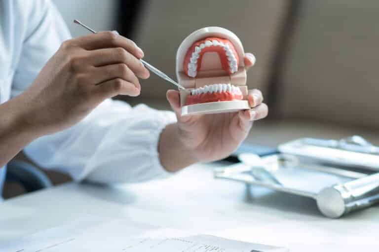 dentist explaining procedure, Curious About What Actually Happens During a Smile Makeover? We Can Help.