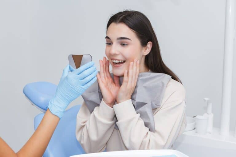 young adult smiling after implants, Why Do Younger Adults Sometimes Need Dental Implants? Age May Matter Less Than You Think